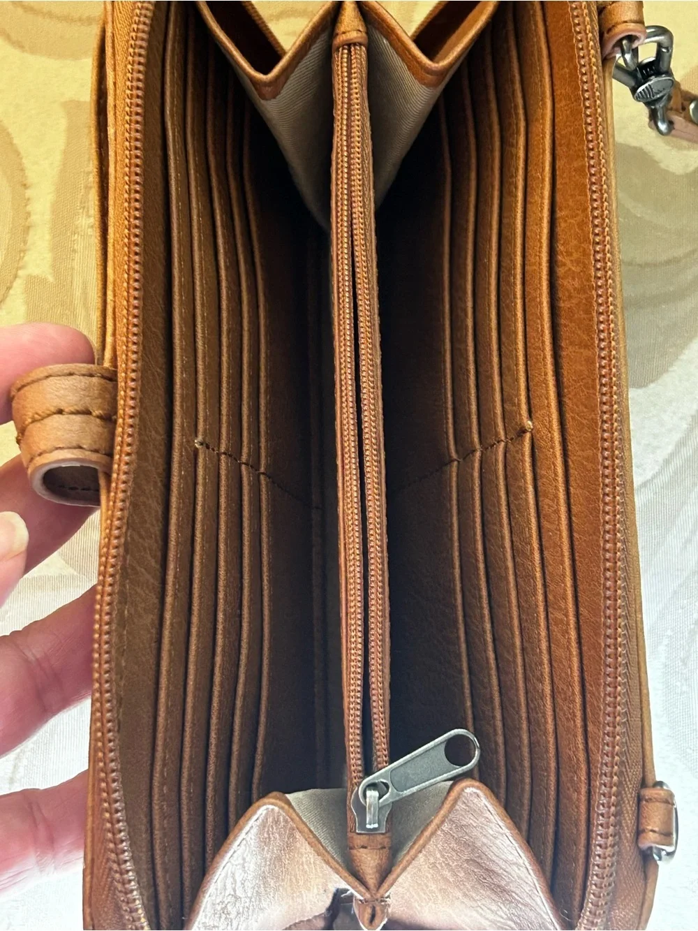 The Sak Smartphone Wristlet Wallet Iris Tobacco Brown Flower Embossed